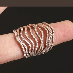 Static waves of sapphires & rose gold large ring